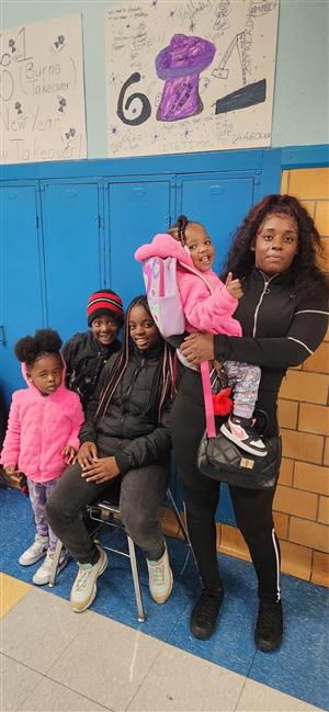 Parent and students wait to see teacher